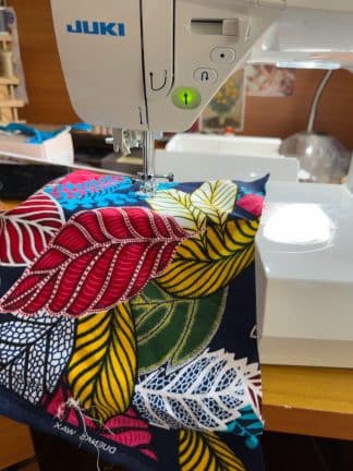 Kitenge fabric on sewing machine