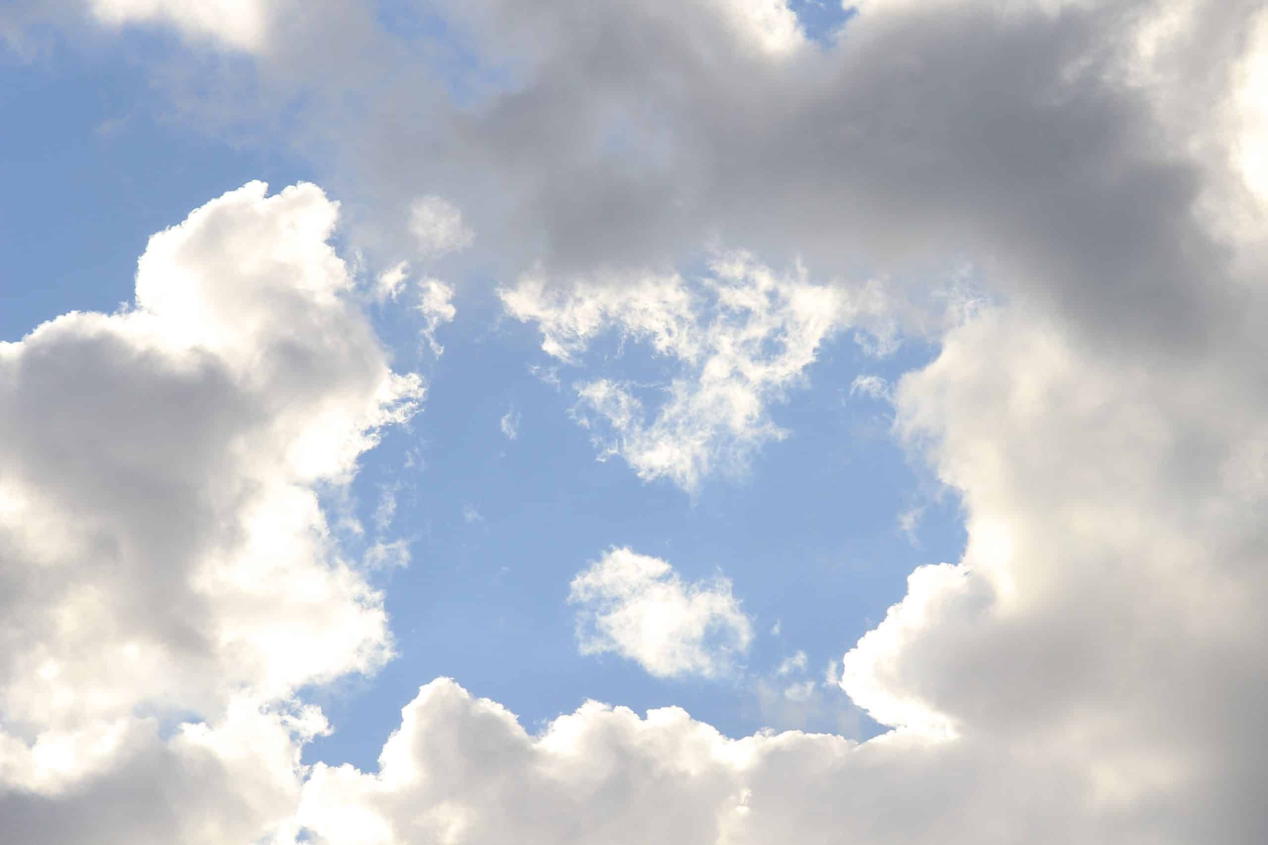 Bright blue sky with big puffy white clouds